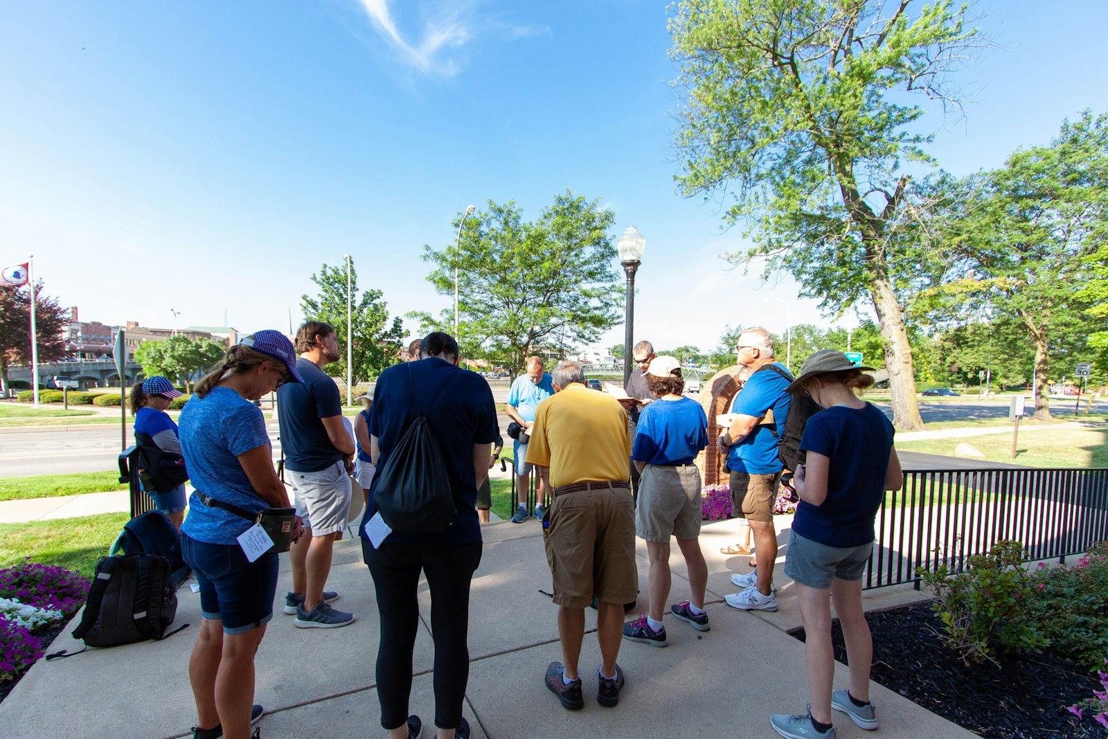 Pilgrims pray before setting out from St. Mary Parish during last year's Rise from the Ashes walking pilgrimage. The pilgrimage takes inspiration from the life of Fr. Gabriel Richard.