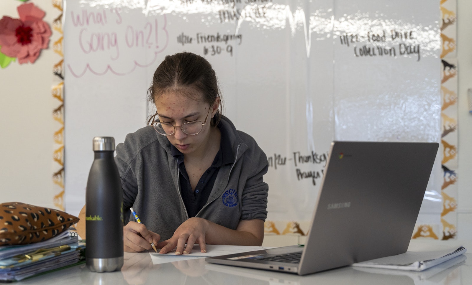 Tenth-grader Emma Rosenzweig takes a geometry test at the learning resource center. Emma said prior to attending Regina, she struggled to get by as public schools could not adequately give her the accommodations that she needed. At Regina, Rosenzweig said she can focus on her academics instead of just trying to get by.