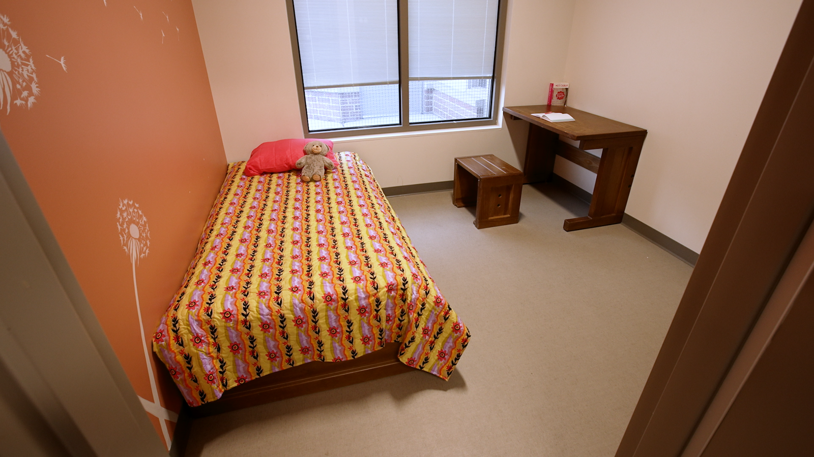 A typical room for girls who are in the residential mental health treatment program.