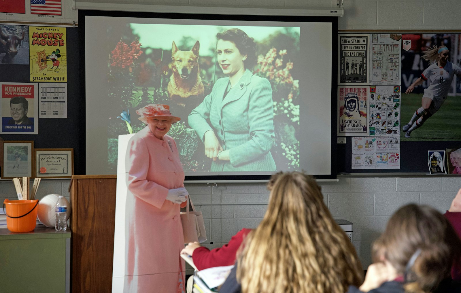 Rutkowski teaches a lesson on Queen Elizabeth II's reign. He said it will be strange not having Queen Elizabeth as the reigning British monarch, but her presence will continue to rule his classroom.