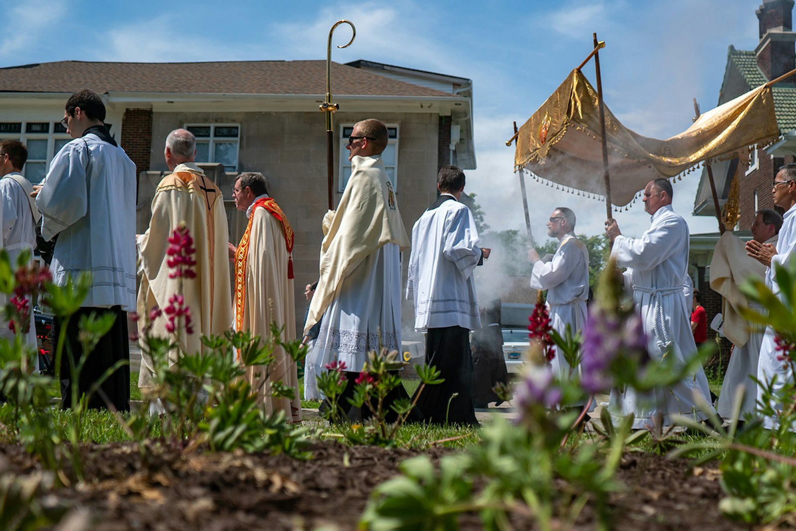 Archbishop Vigneron leads a two-mile Eucharistic procession from the Cathedral of the Most Blessed Sacrament to Sacred Heart Major Seminary in Detroit to launch the National Eucharistic Revival in the Archdiocese of Detroit on June 19, 2022. (Matthew Rich | Special to Detroit Catholic)