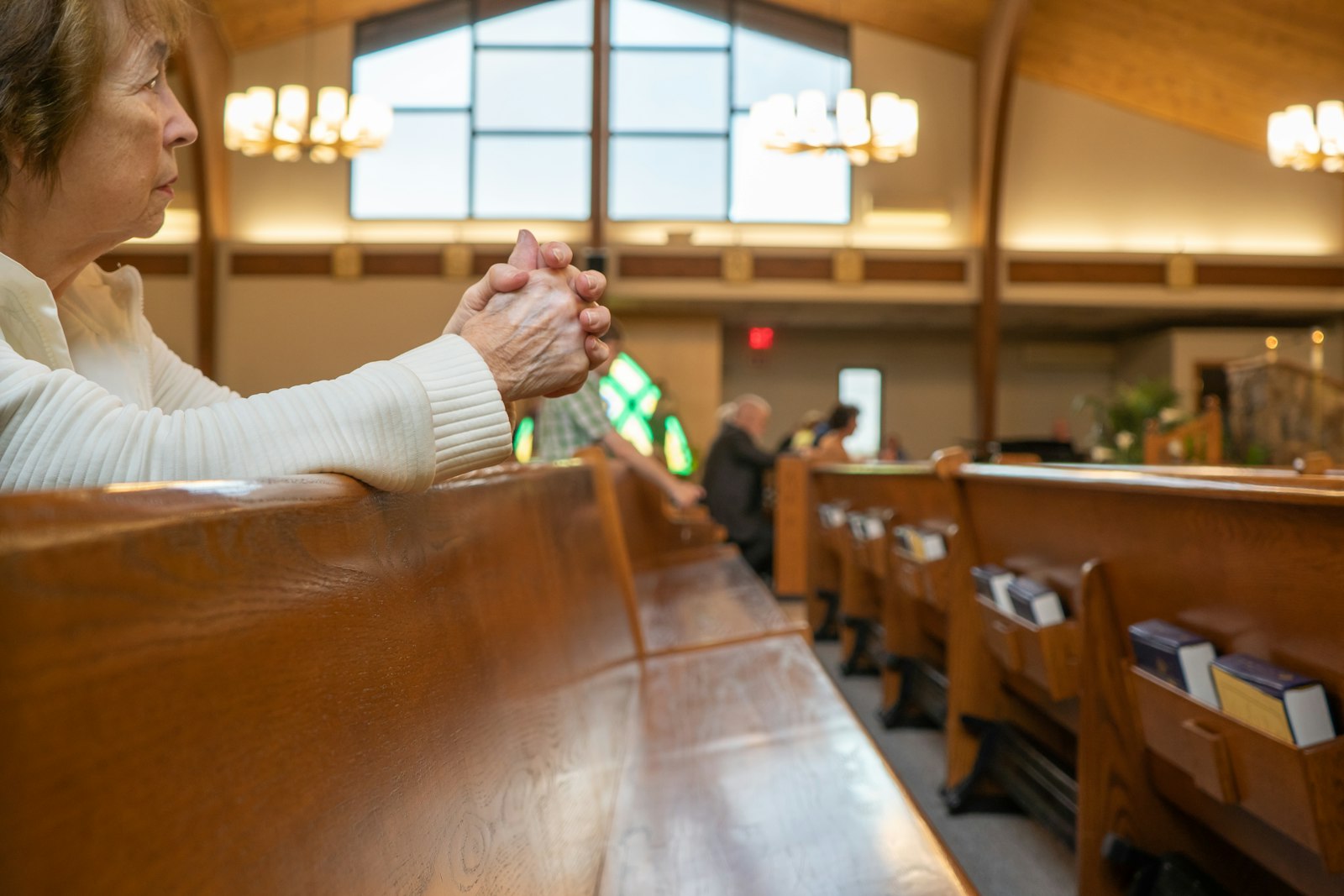 A woman prays before the Blessed Sacrament at SS. Peter and Paul Parish in North Branch. “After COVID, people got into the habit of not coming to Mass," said Fr. Rich Treml, pastor of SS. Peter and Paul. "I think we really need a Eucharistic revival now more than ever. We take our faith for granted. We take the Eucharist for granted.”