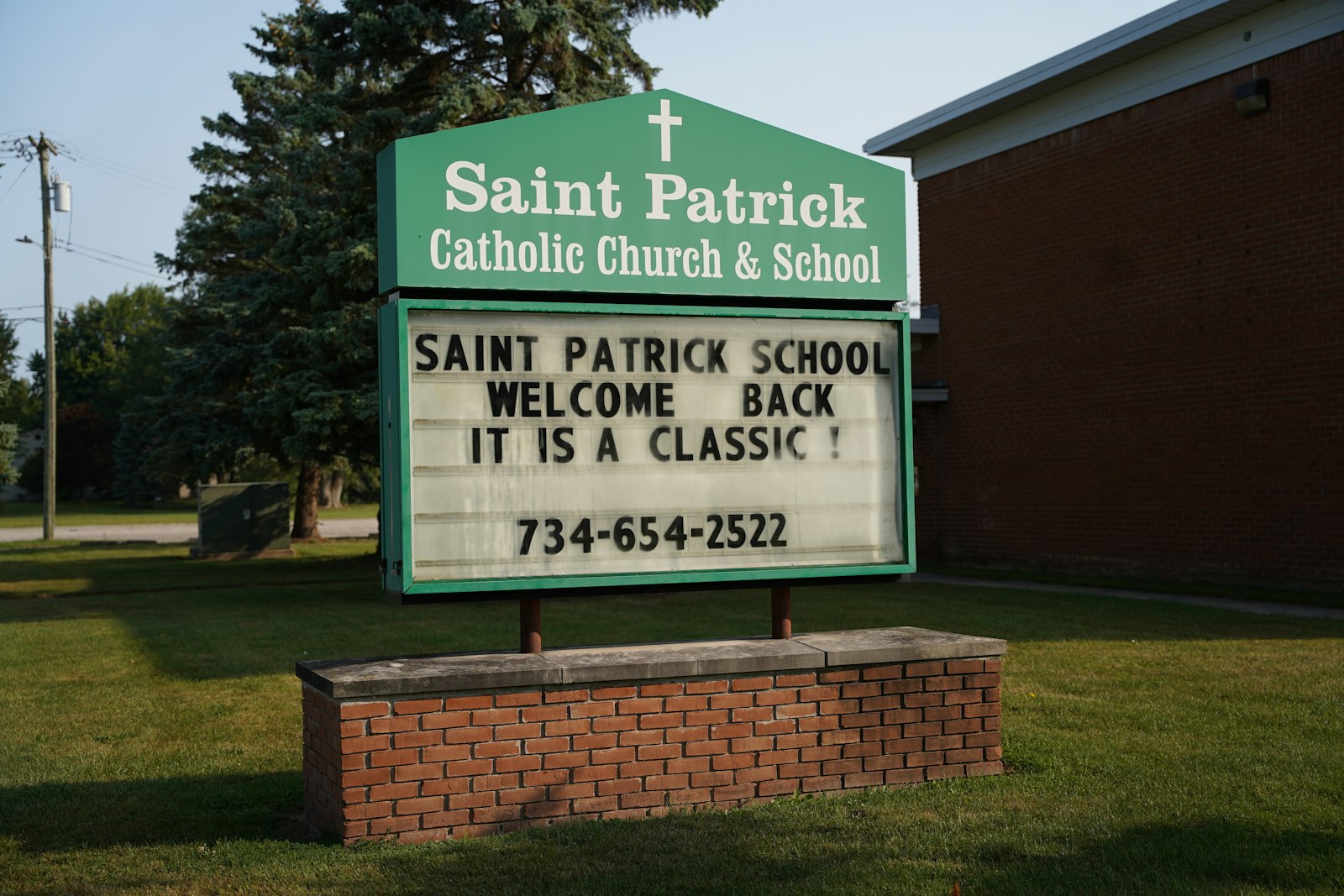 A sign outside St. Patrick School in Carleton announces the school's switch to a classical-style curriculum at the start of the 2022-23 academic year. (Daniel Meloy | Detroit Catholic)