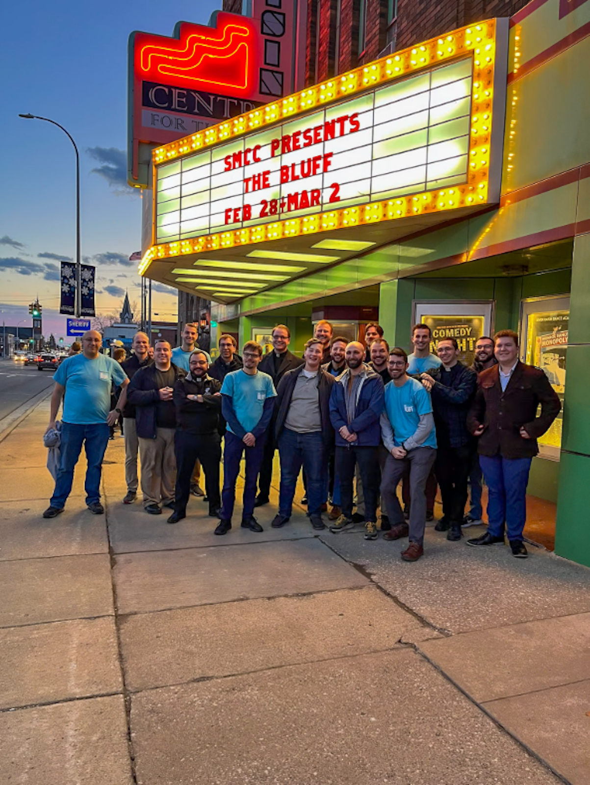 Seminarians from Sacred Heart Major Seminary's original performance of "The Bluff" pose for a group photo outside the River Raisin Centre for the Arts, where their counterparts from St. Mary Catholic Central were about to perform. (Photos by Isabella Grippi-Amoroso | Special to Detroit Catholic)