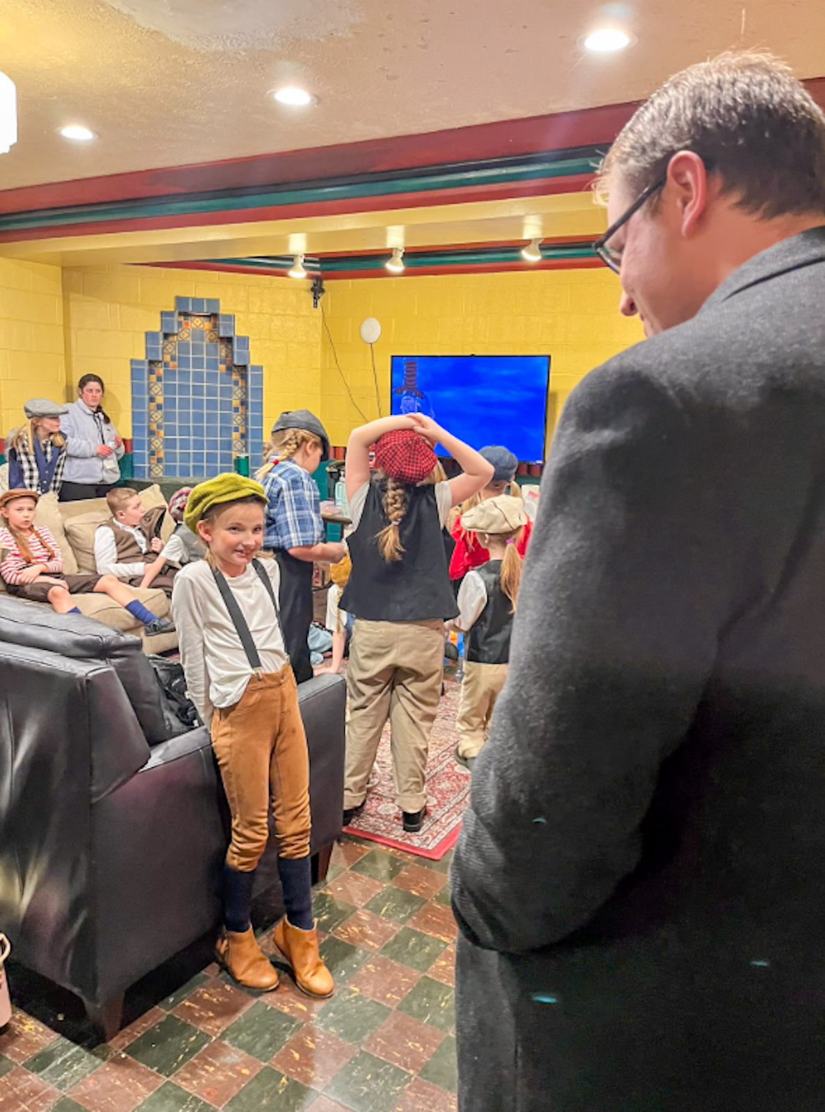 Fr. Steven Caraher of the Diocese of Gary, who co-wrote "The Bluff" and directed its first performance at Sacred Heart Major Seminary, greets SMCC cast members in the green room.