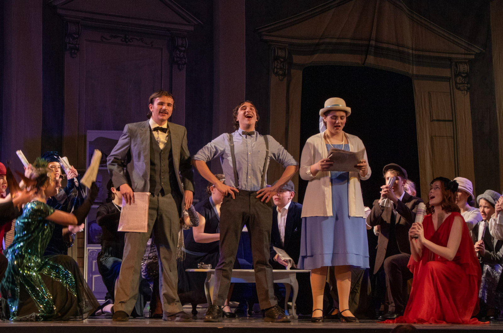 Cast members from St. Mary Catholic Central High School in Monroe perform "The Bluff," an original murder-mystery musical written and performed by Sacred Heart Major Seminary seminarians, on stage during a dress rehearsal at the River Raisin Centre for the Arts in Monroe on Feb. 25. (Photo by Isabella Grippi-Amoroso | Special to Detroit Catholic)