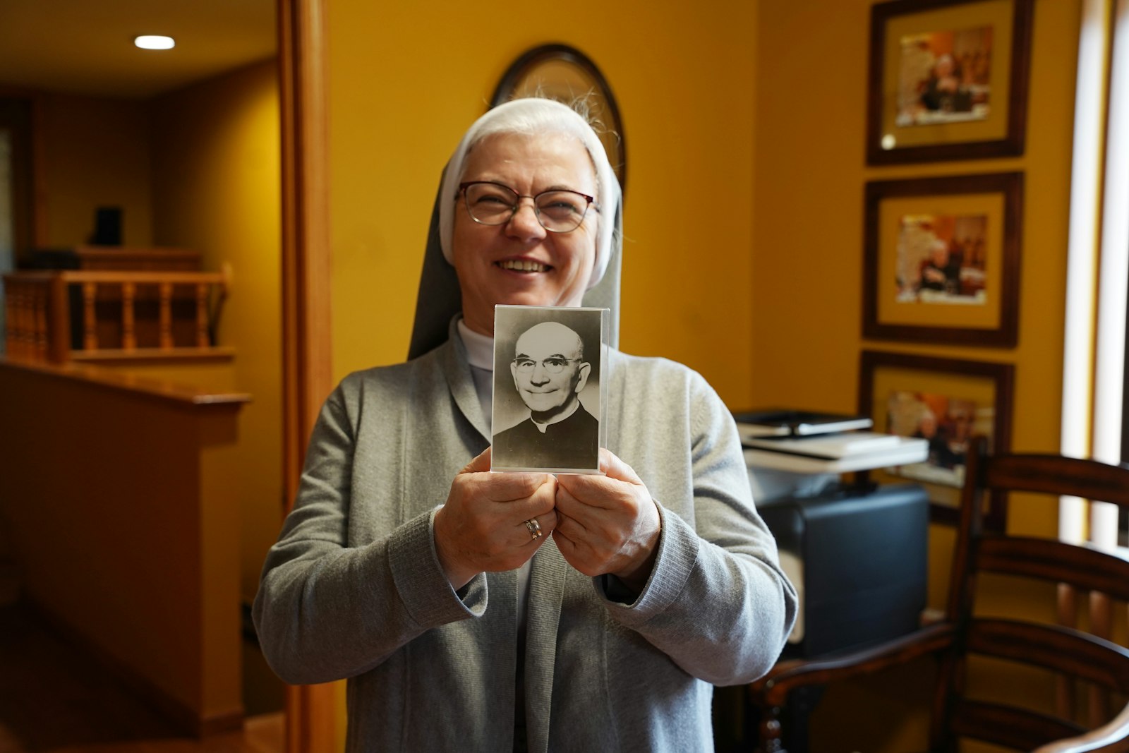Sr. Kokolus holds up a picture of Fr. Ignacy Posadzy, the co-founder of the Society of Christ, who led a congregation of trained Polish priests to leave Poland and go out and minister to the Polish diaspora. Fr. Posadzy was recently declared venerable by Pope Francis.