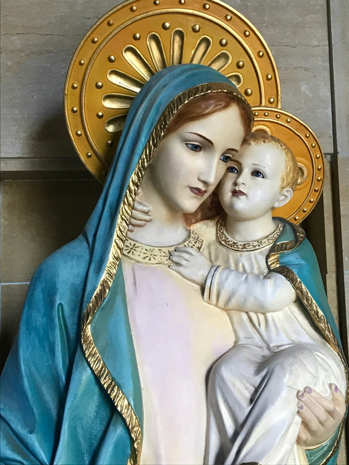 A statue of the Blessed Virgin Mary holding the Christ Child, pictured, was destroyed Mach 8 when a man broke into the parish vestibule. (Courtesy of St. Mary Parish)