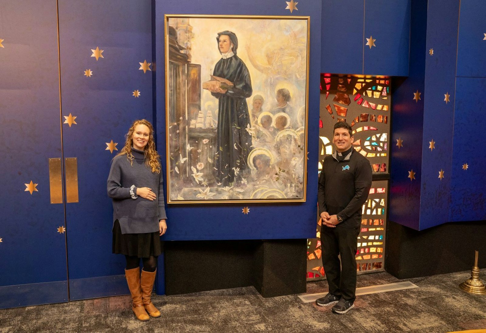 The renovations to the St. Elizabeth Ann Seton Parish sanctuary, with a rich blue background decorated with stars, plus the addition of five murals depicting figures in heaven, are visual aides for parishioners to be made more aware of the of the heavenly scene that takes places at every Mass.