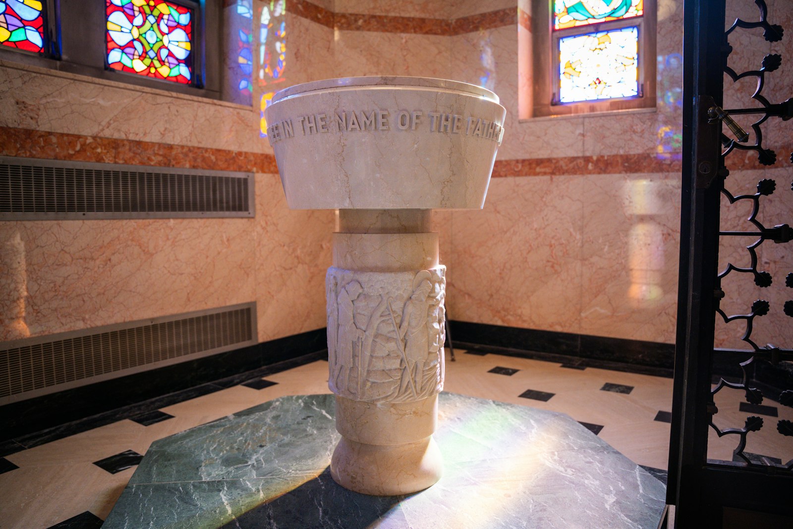 The original baptismal font at St. Matthew Church is set apart from the rest of the church, a callback to earlier theological lessons in church architecture. Fr. Novelly now baptizes people in the church, but usually vests for Mass in the original baptistry.