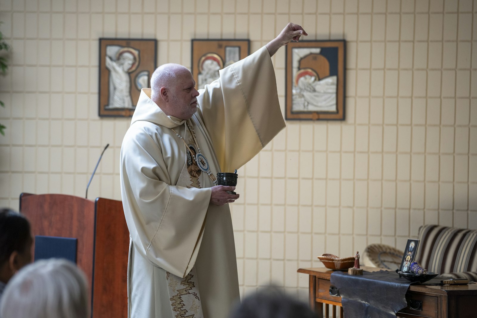 Deacon Steven Morello, a member of the Sault Ste. Marie Tribe of Chippewa Indians on his mother’s side, is the Archdiocese of Detroit's missionary to the American people. During the prayer service, he offered a prayer, and gift of tobacco, to the Holy Spirit in the four directions.