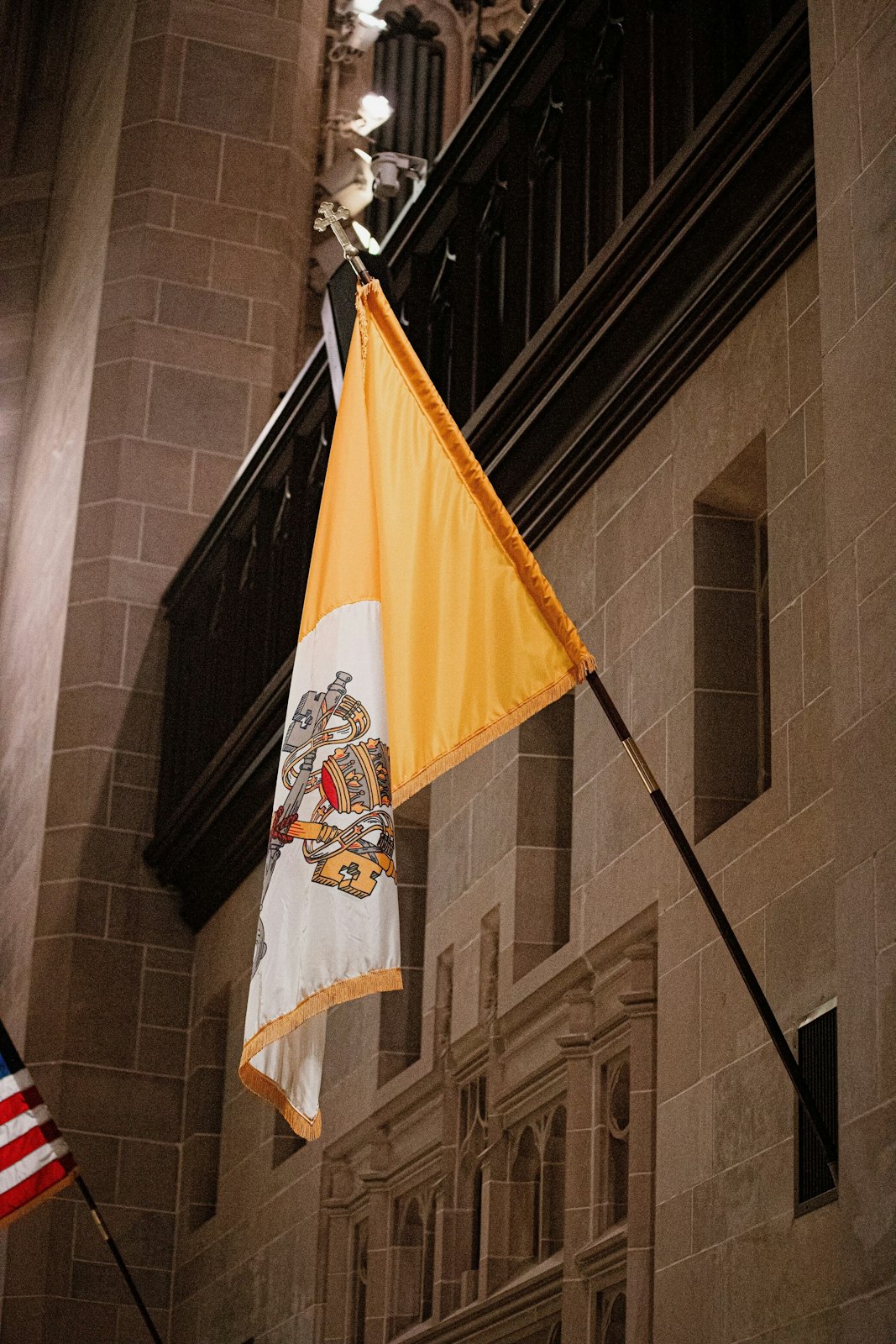 The Vatican flag is pictured hanging in the back of the Cathedral of the Most Blessed Sacrament. Pope Benedict XVI's life was first and foremost about following Jesus as a disciple, friend and beloved son.
