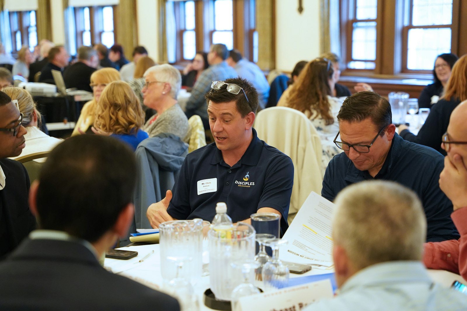 Synod listening session participants discuss ways in which they have seen more collaboration and accommodations since the launching of Families of Parishes.