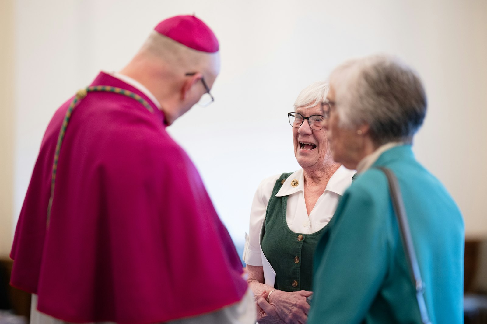 Friends and well-wishers gather in the seminary's parlors March 17 to greet their new shepherd ahead of Archbishop-designate Weisenburger's installation Mass the next day. (Tim Fuller | Special to Detroit Catholic)