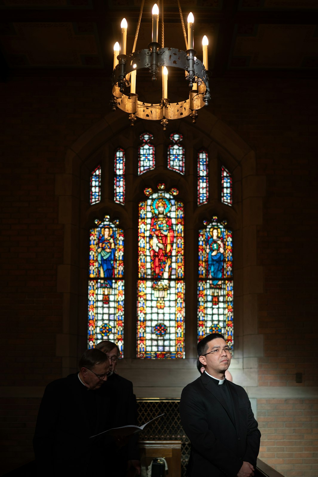 Priests and seminarians pray in the chapel at the start of the vespers service. (Tim Fuller | Special to Detroit Catholic)