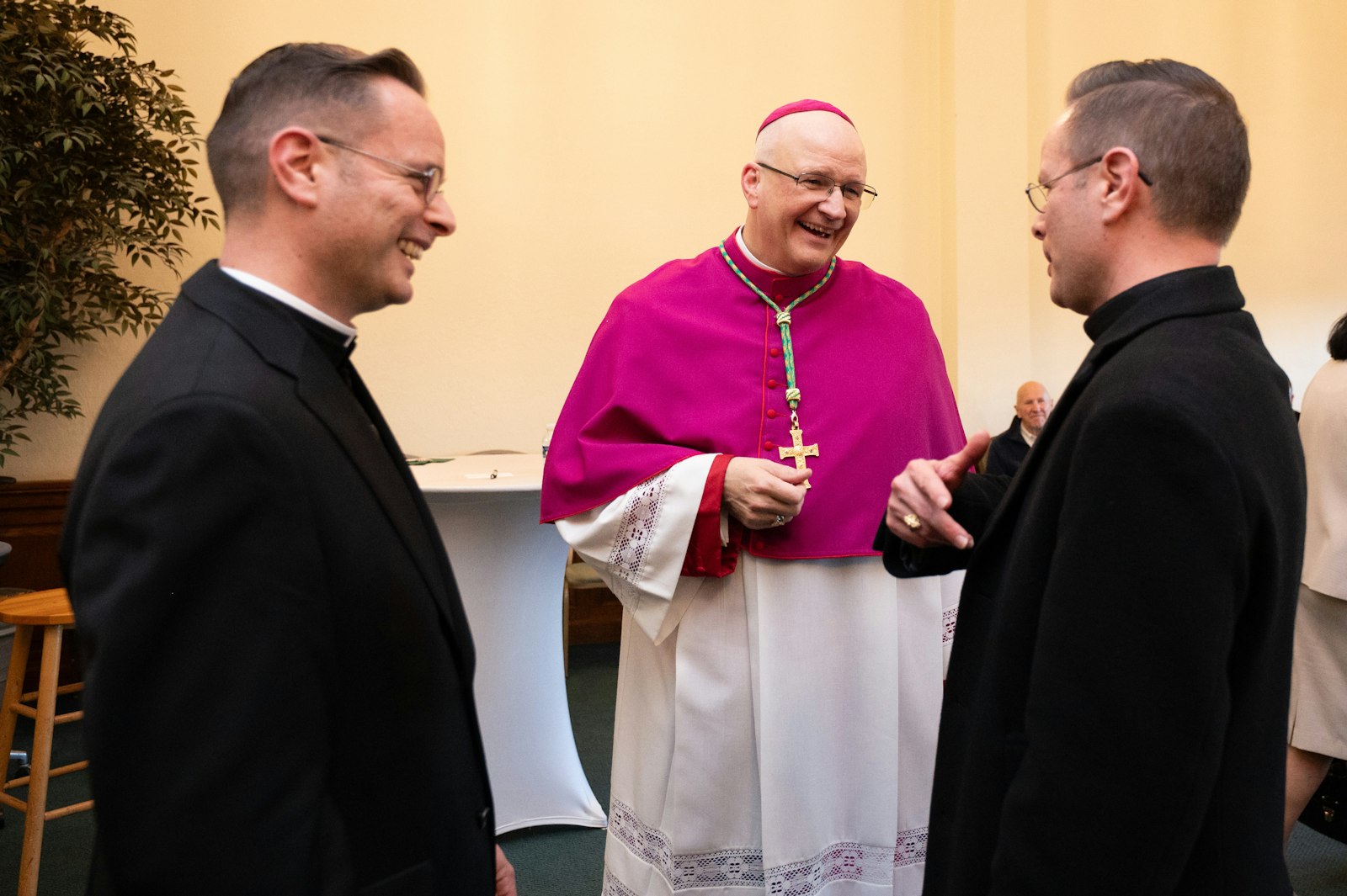 Archbishop-designate Weisenburger chats with Fr. James Arwady and his brother, Fr. Raymond Arwady, following the vespers service. (Tim Fuller | Special to Detroit Catholic)