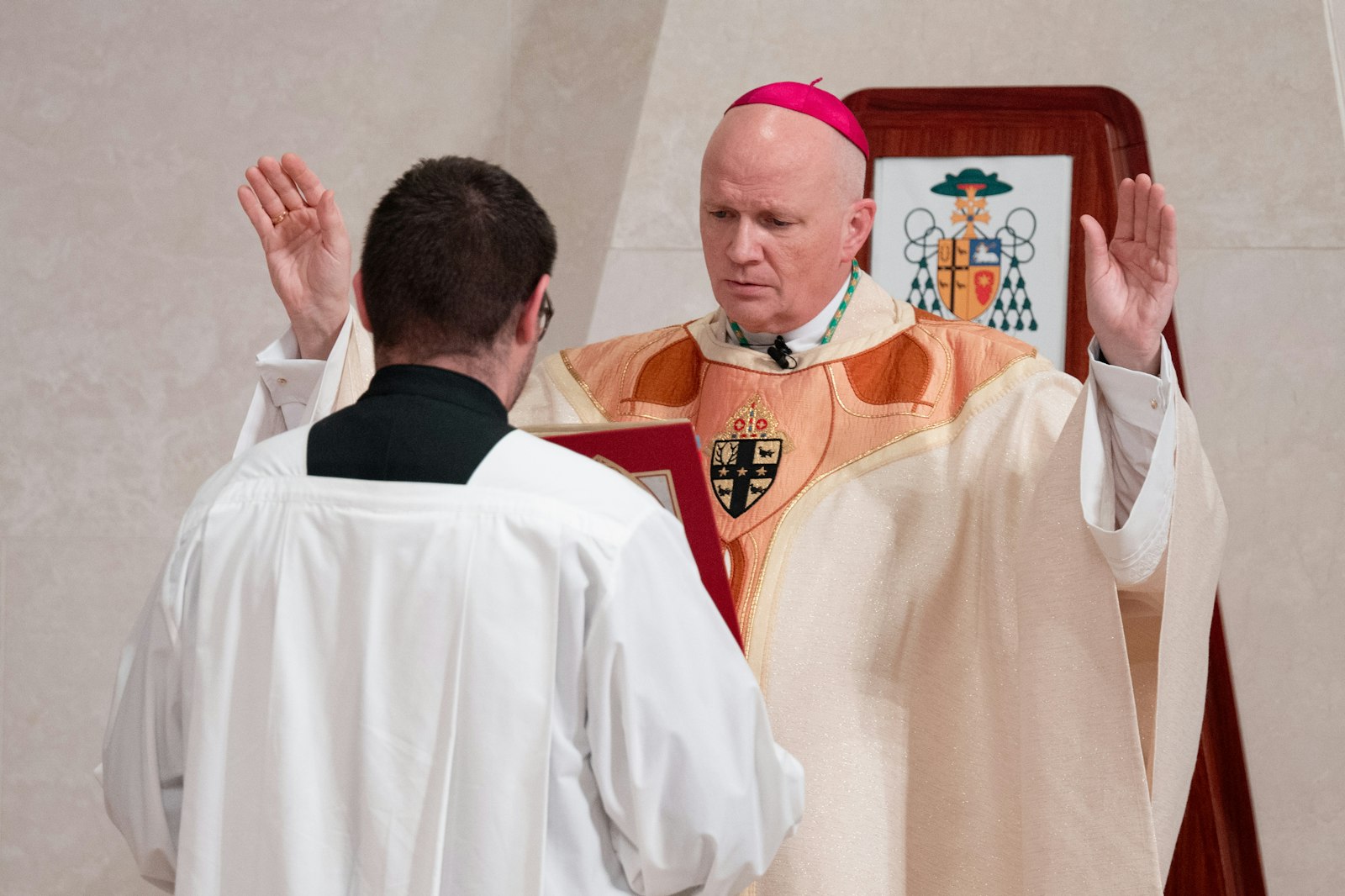 Archbishop Weisenburger prays near the end of his installation Mass on March 18. At the end of Mass, he offered his first blessing as archbishop of Detroit. (Tim Fuller | Special to Detroit Catholic)