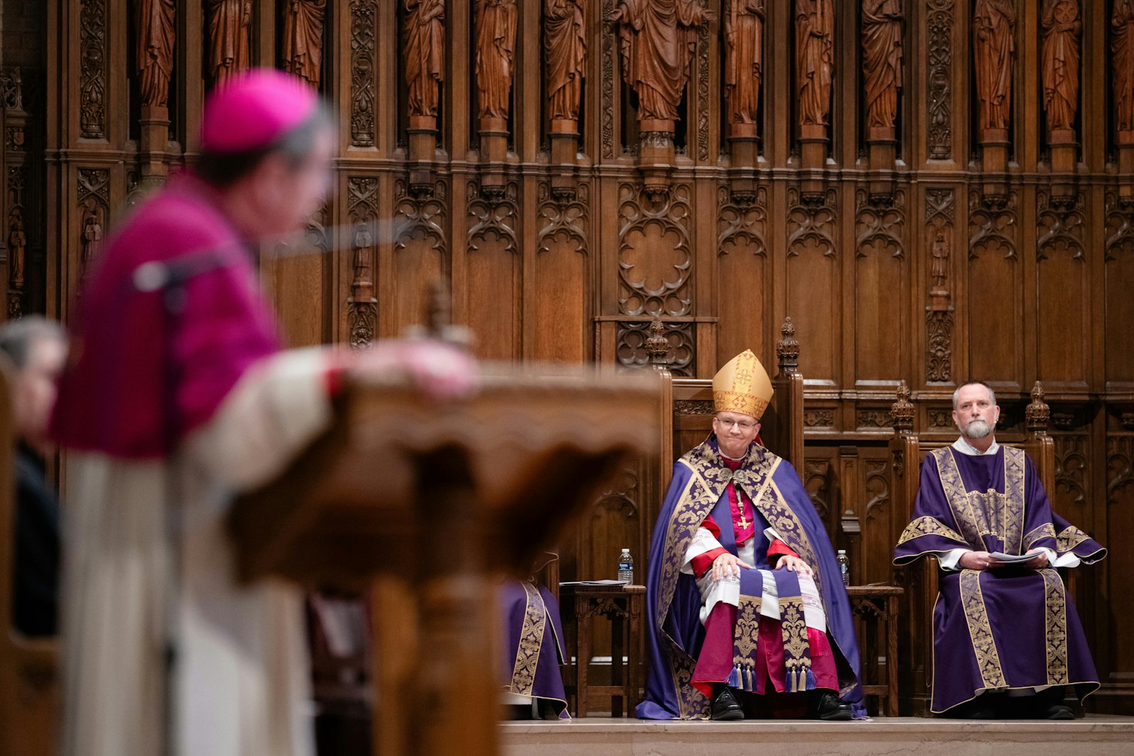 Archbishop-designate Weisenburger smiles as Archbishop Vigneron offers his thanks to God for sending the Archdiocese of Detroit a shepherd "to whom we can present our request to see Jesus.” Archbishop Vigneron, who offered the homily during the prayer service, said Archbishop-designate Weisenburger's dedication as a shepherd will bring great blessings upon the Church in Detroit. (Tim Fuller | Special to Detroit Catholic)