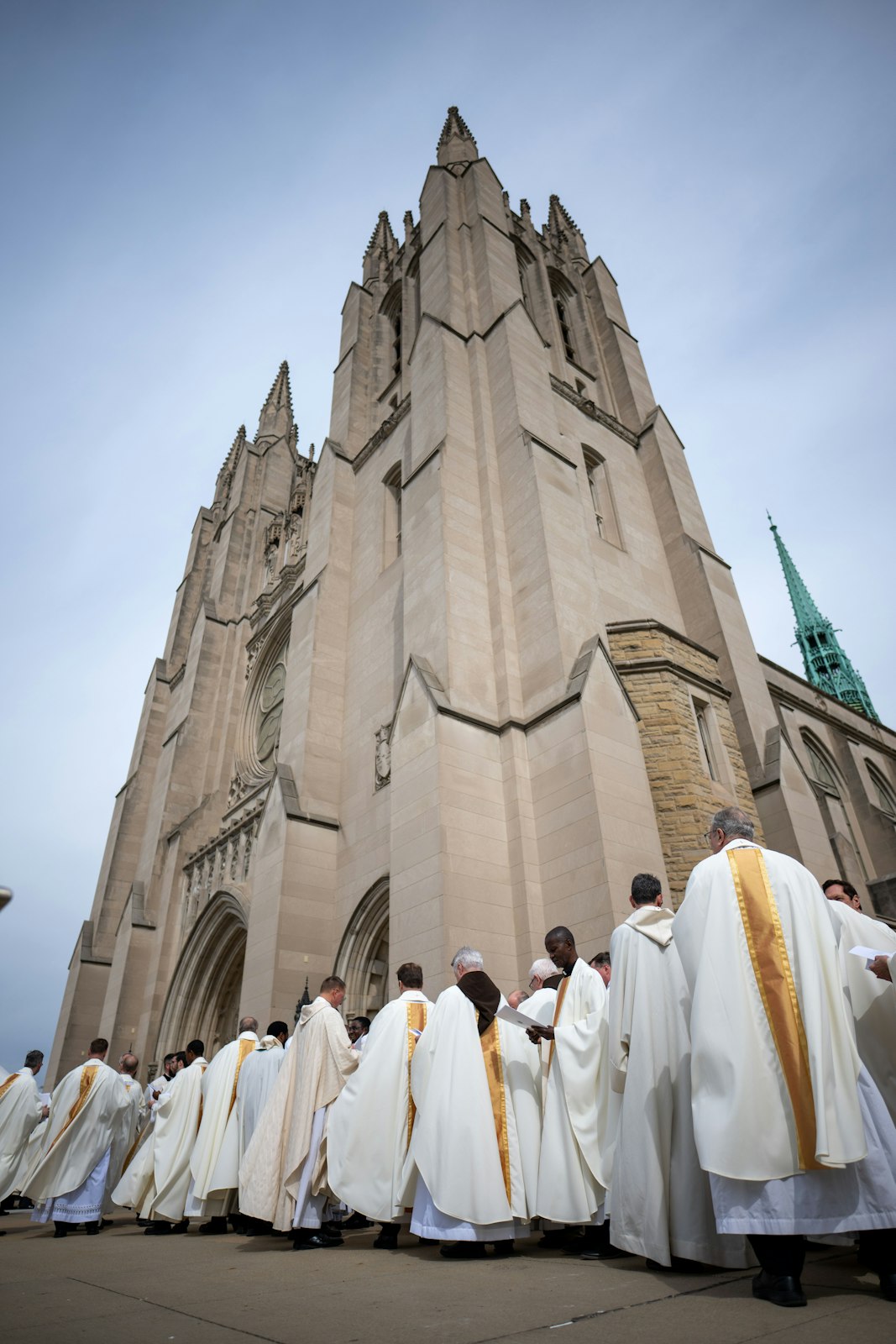 Hundreds of deacons, priests, bishops and members of various fraternal organizations line up for the opening procession into the Cathedral of the Most Blessed Sacrament to start the installation liturgy. (Tim Fuller | Special to Detroit Catholic)