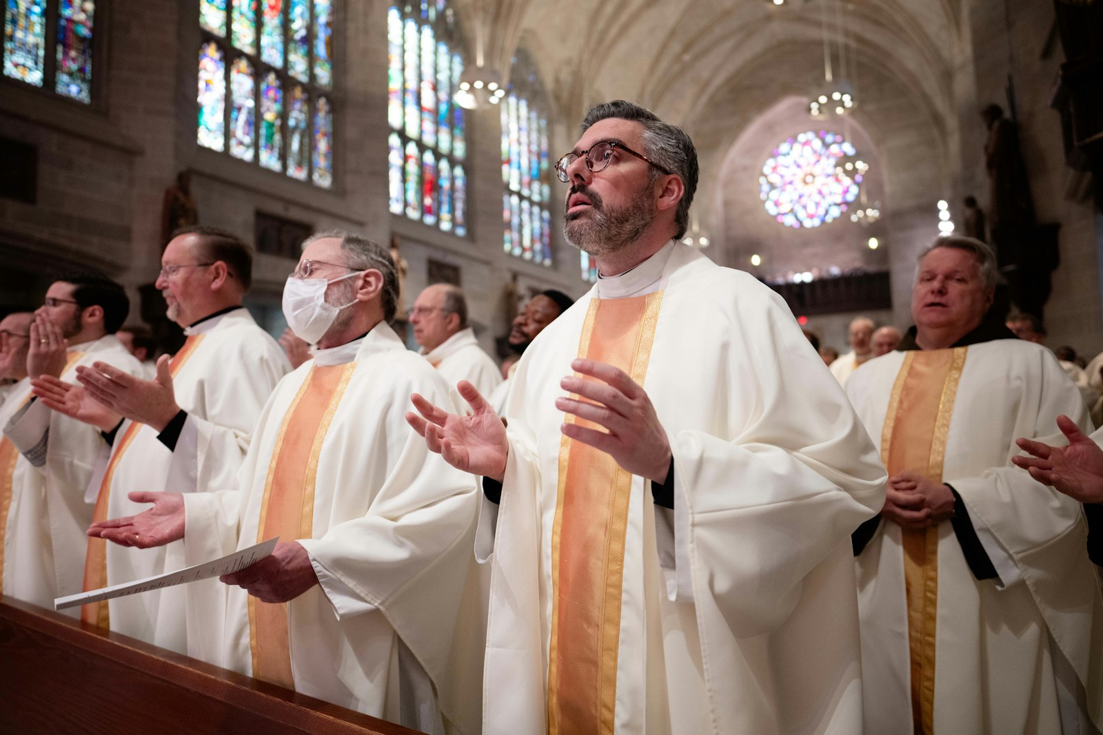 Priests of the Archdiocese of Detroit pray with Archbishop Weisenburger during the Eucharistic prayers of the liturgy. About 250 clergy participated in the installation Mass. (Tim Fuller | Special to Detroit Catholic)