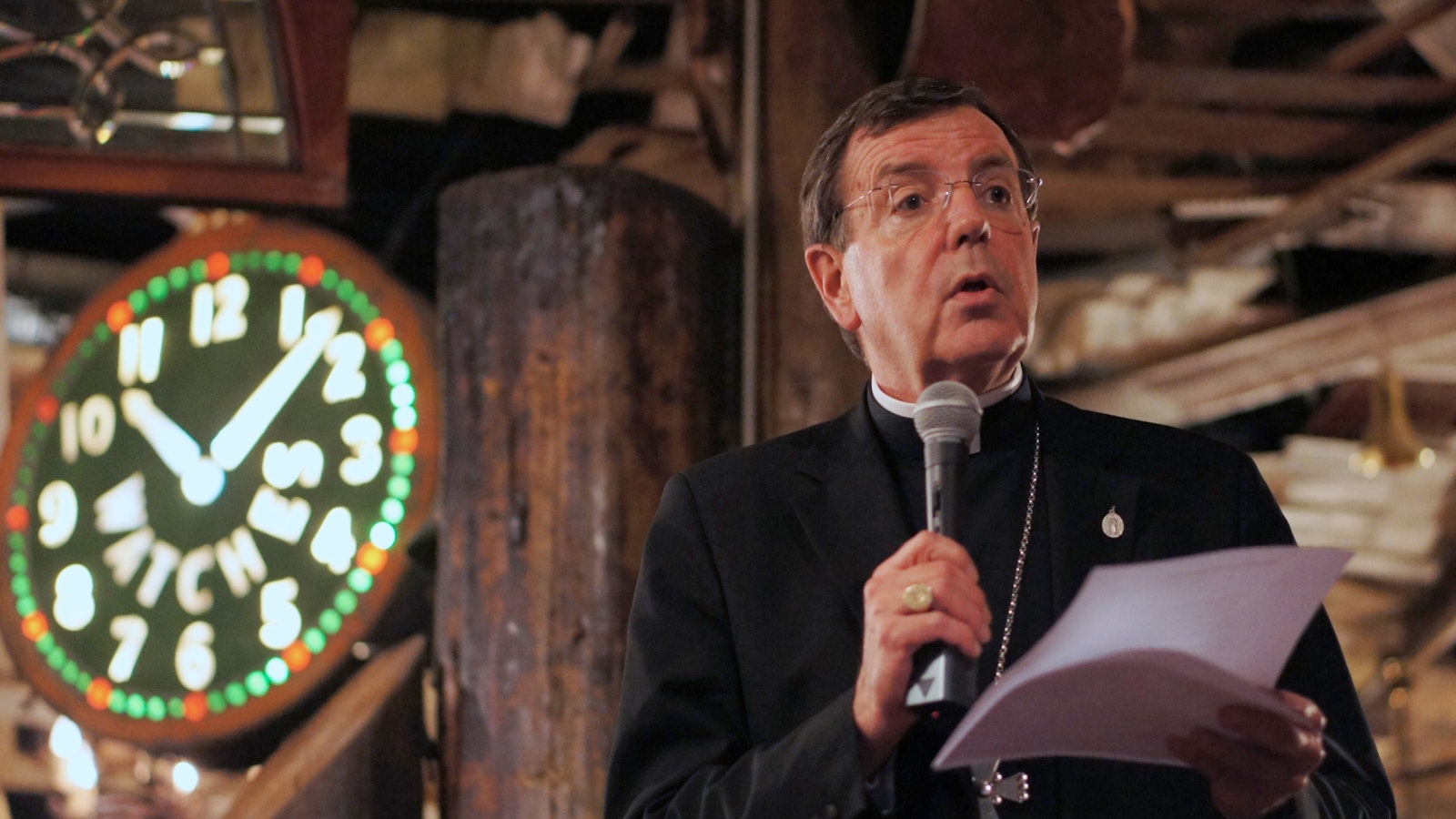 Archbishop Vigneron offers thoughts on practical ways to live the corporal and spiritual works of mercy during a Theology on Tap night April 8, 2015, at the Traffic Jam & Snug restaurant in Detroit. (Tim Hinkle | Detroit Catholic file photo)