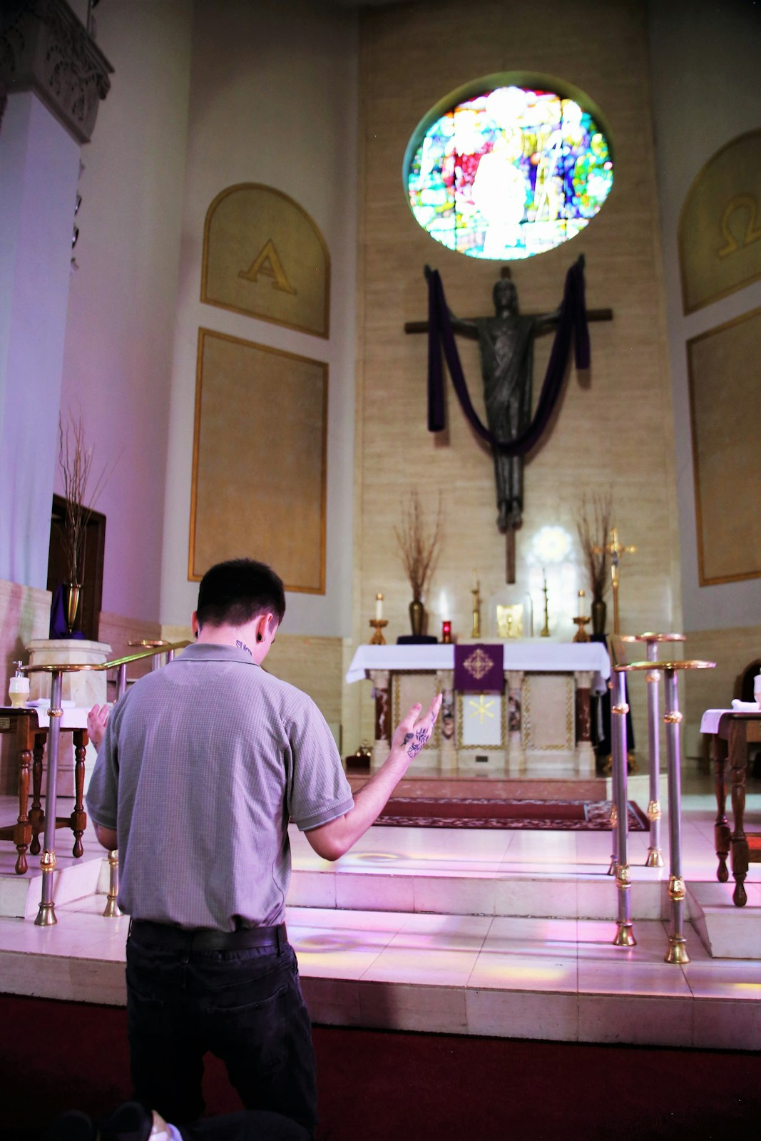 Trent Vecchiarino prays before the altar at St. Mary of the Immaculate Conception Parish in Monroe, where he'll be baptized next Sunday at the Easter vigil. Discovering the power of forgiveness has radically changed Trent's life. “I just drop to my knees and ask for God to come to me," Trent says. "And He comes immediately, saves me from my destructive mindset.”