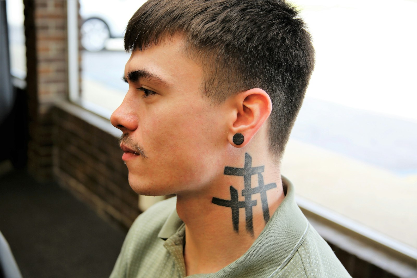A tattoo on Trent's neck depicts three crosses representing the tragic deaths of three of Trent’s close friends. As he grows closer to Christ in his newfound Catholic faith, the tattoos covering Trent's body have taken on multiple meanings to him.