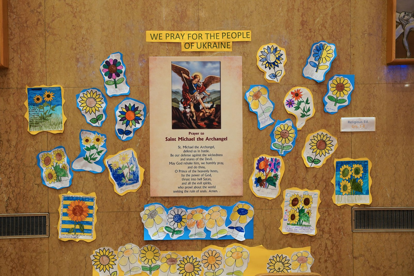 St. Clare of Montefalco School students made a display featuring St. Michael the Archangel, patron saint of Kyiv, capital of Ukraine. Ever since Russia invaded Ukraine on Feb. 24, the people of Ukraine have been in the parish's prayer intentions.