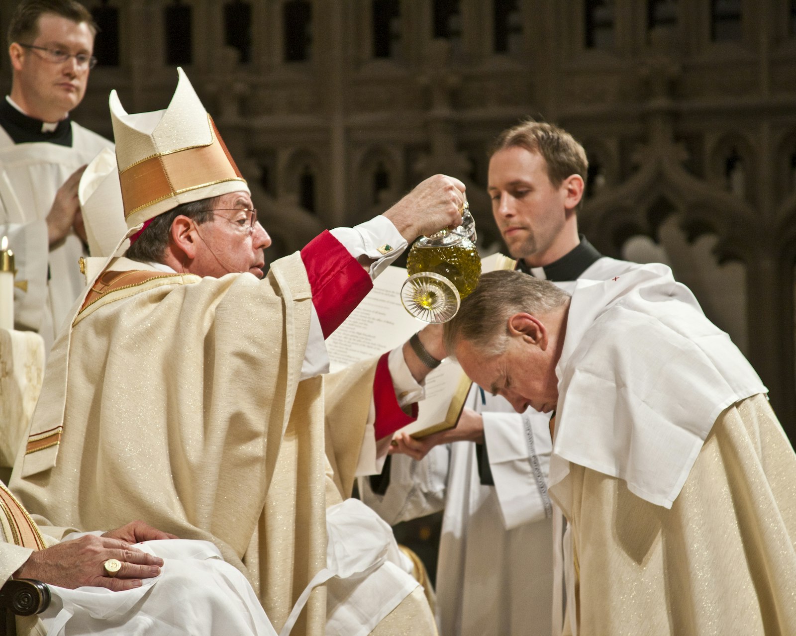 Archbishop Allen H. Vigneron pours Chrism oil over Bishop Hanchon's head during his episcopal ordination at the Cathedral of the Most Blessed Sacrament on May 5, 2011. (Larry A. Peplin | Detroit Catholic file photo)