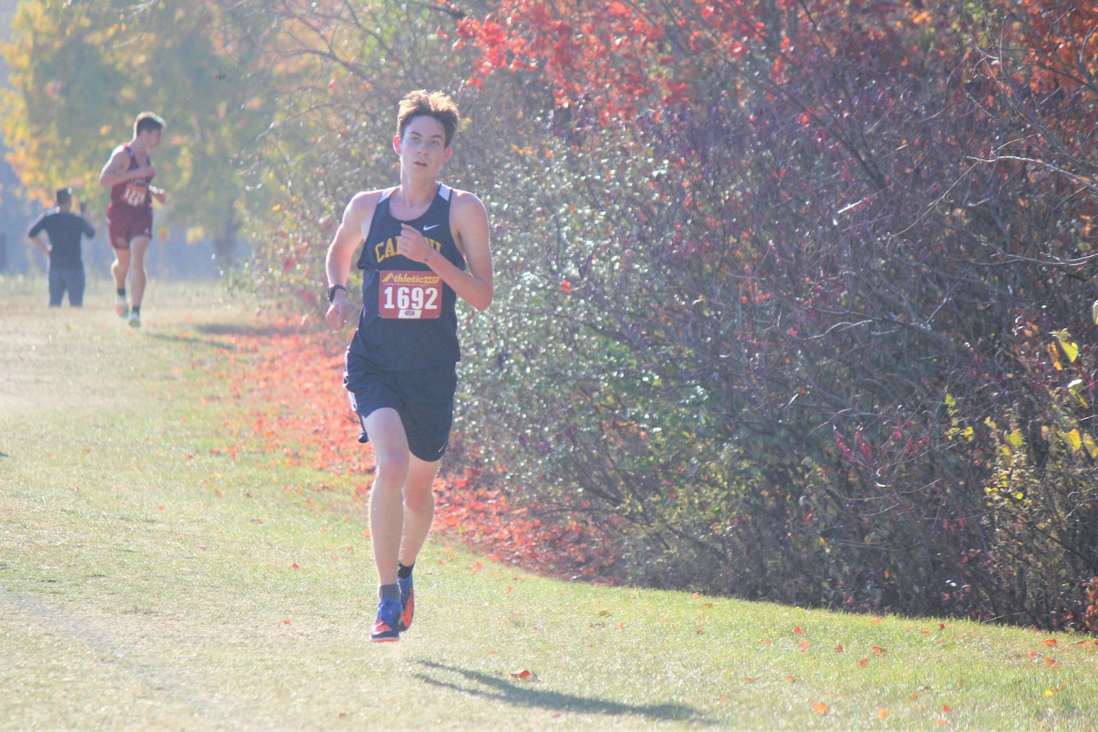 Allen Park Cabrini senior Christopher Russelberg won the Cardinal Division individual championship going away, covering five kilometers in 16:31.6.