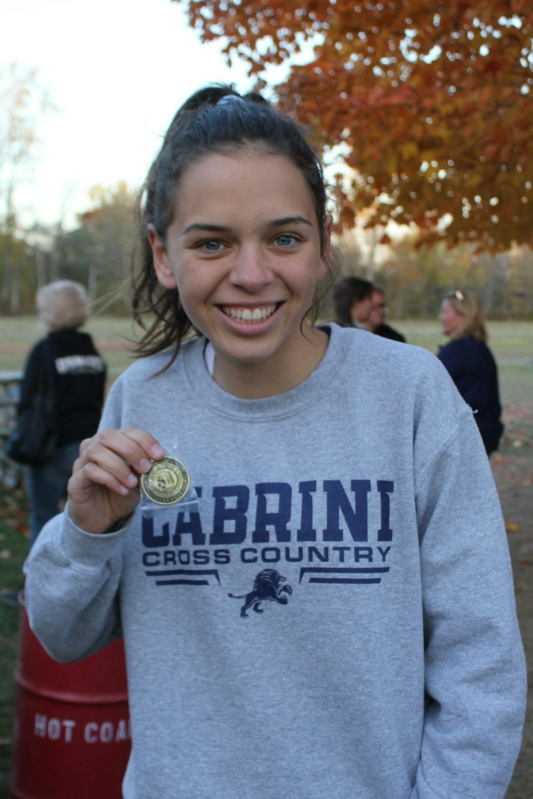 Cabrini’s Ava Teed won her third individual championship in three years, running 19:44.9 to win the girls’ Cardinal Division race.