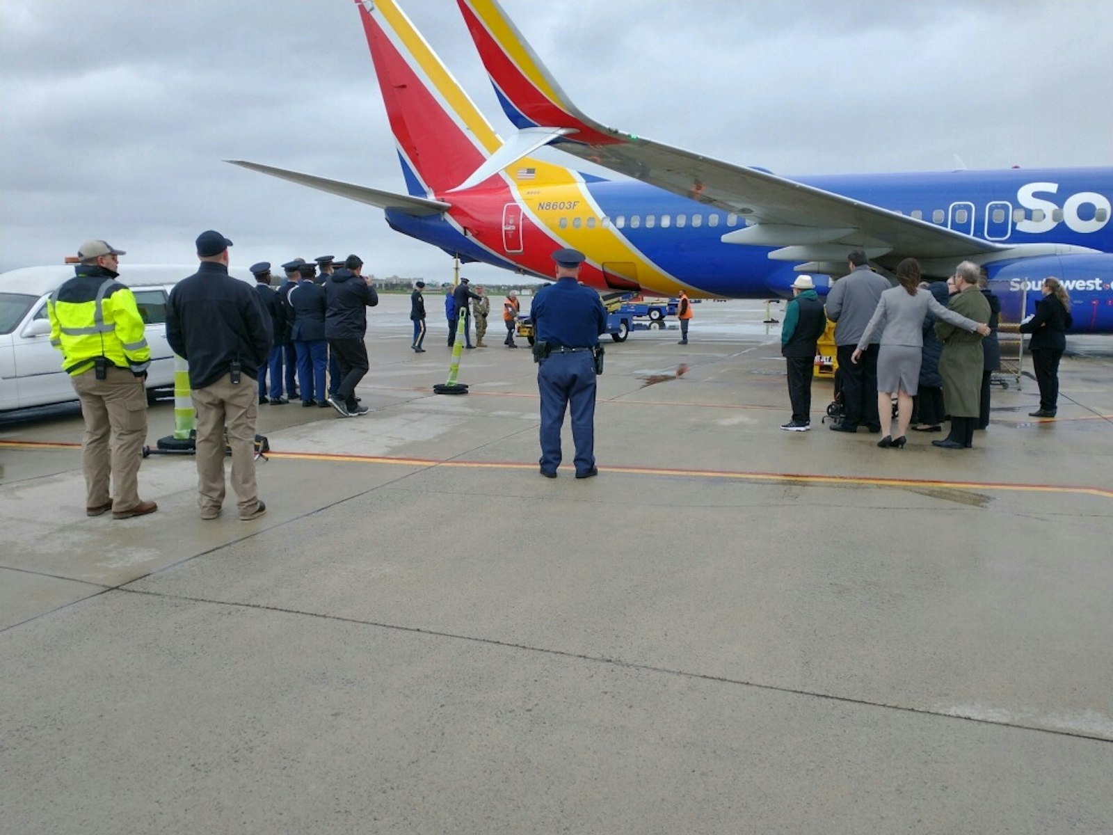 A group of volunteers, called “the care team,” stand alongside a plane as fellow servicemen carry the ashes of their fellow brothers and sisters in arms down the ramp. “We are there to be present with that family, and I am present as a chaplain ... we are there to extend our condolences and to address any needs they might have, which as chaplain is from a spiritual side,” Deacon Van Dyke said.