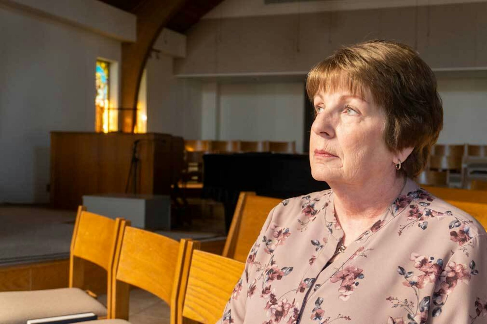 Kathleen Damman, a co-leader of the Diocese of Lansing's healing retreats for abuse survivors, and a survivor of clergy abuse herself, pictured at her parish, St. Agnes Catholic Church in Fowlerville.