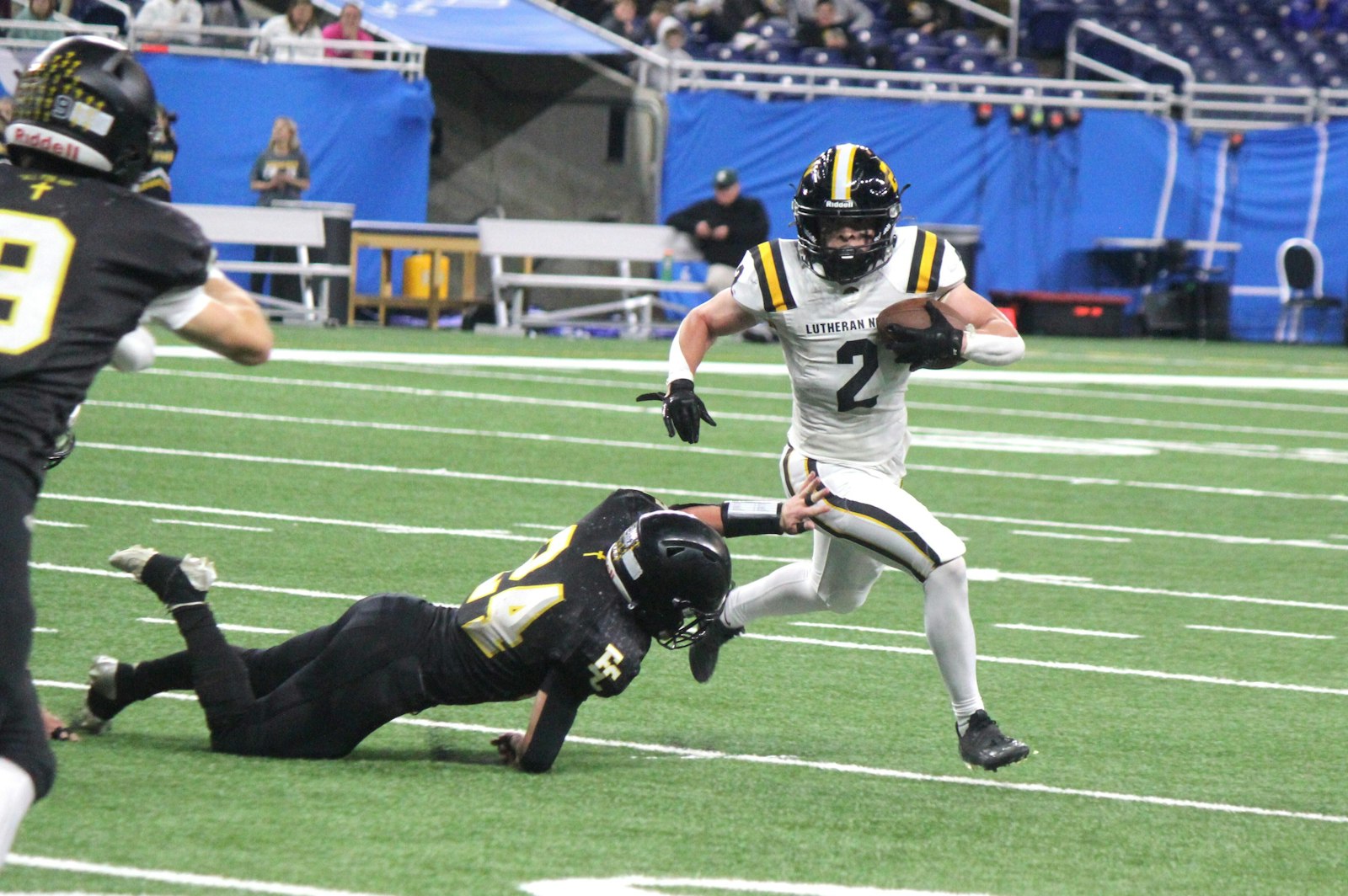 Jack May, shown here running the ball in the Prep Bowl, caught a touchdown pass from Cam Kubik with 15 seconds left in regulation play in Lutheran North’s district final against Croswell-Lexington. Lutheran North eventually won, 43-42, in overtime.