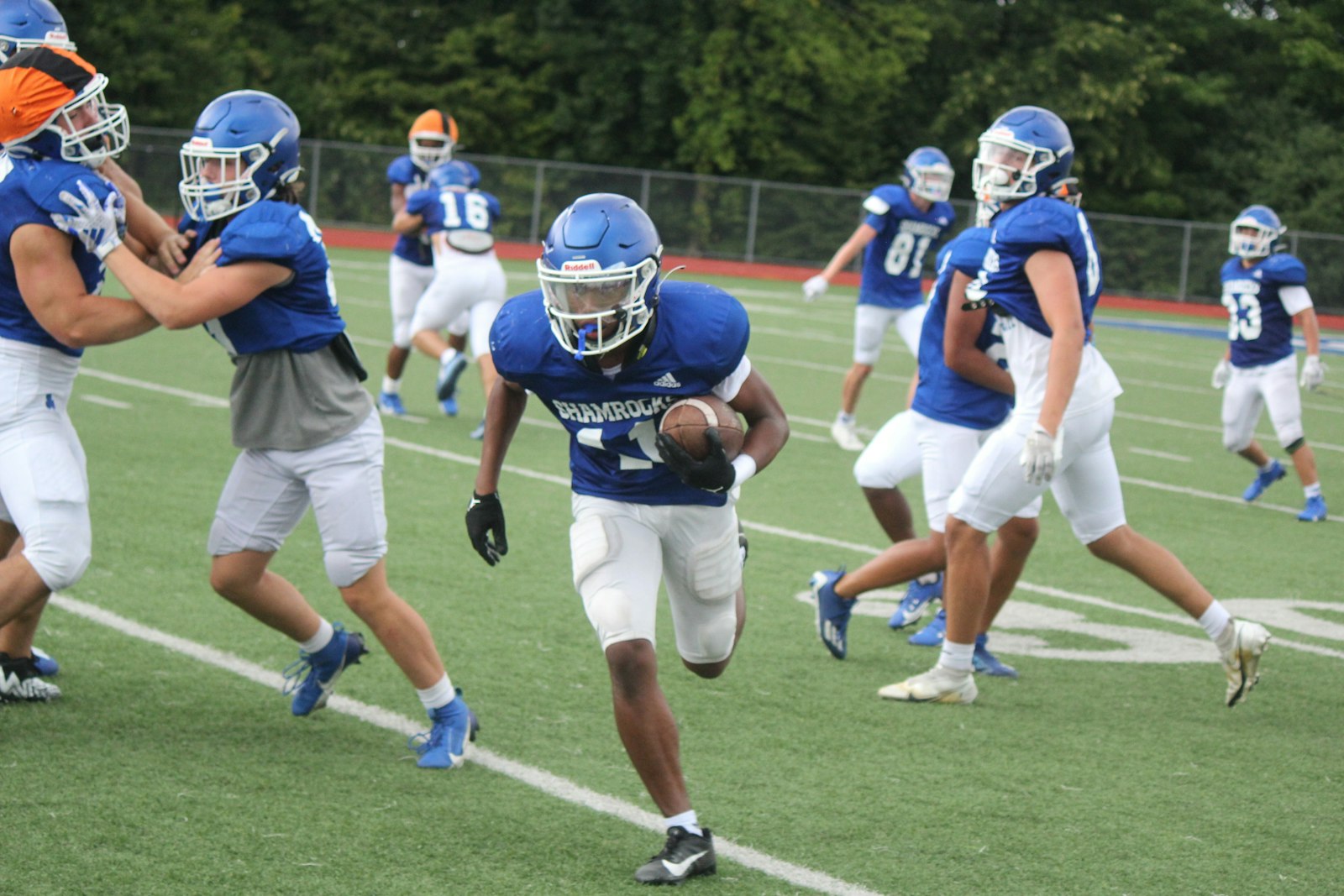 River Chaney returns a kickoff during a special teams run-through during Detroit Catholic Central’s Aug. 12 practice at the school.