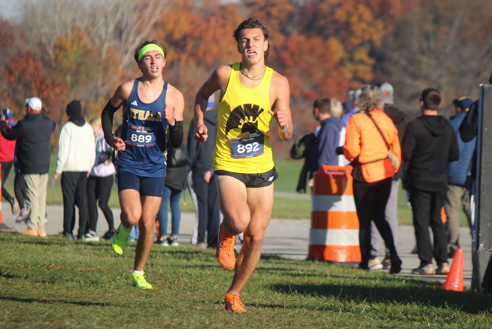 Jackson Lumen Christi senior Isaiah Dinverno (892) pulls away from Ithaca’s Landen Styka at the two-mile mark. Dinverno eventually finished fourth while Styka was sixth in the Division 3 championship race.