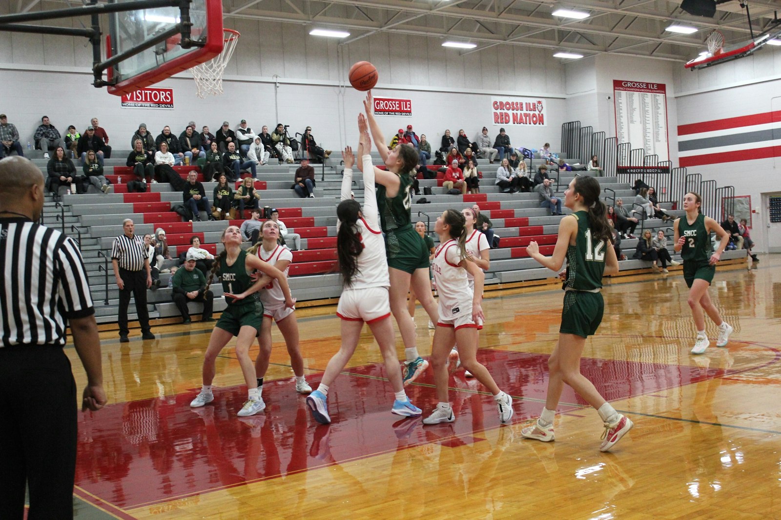 Natalie LaPrad shoots a basket to break a 26-26 tie in the fourth quarter of SMCC’s come-from-behind win.