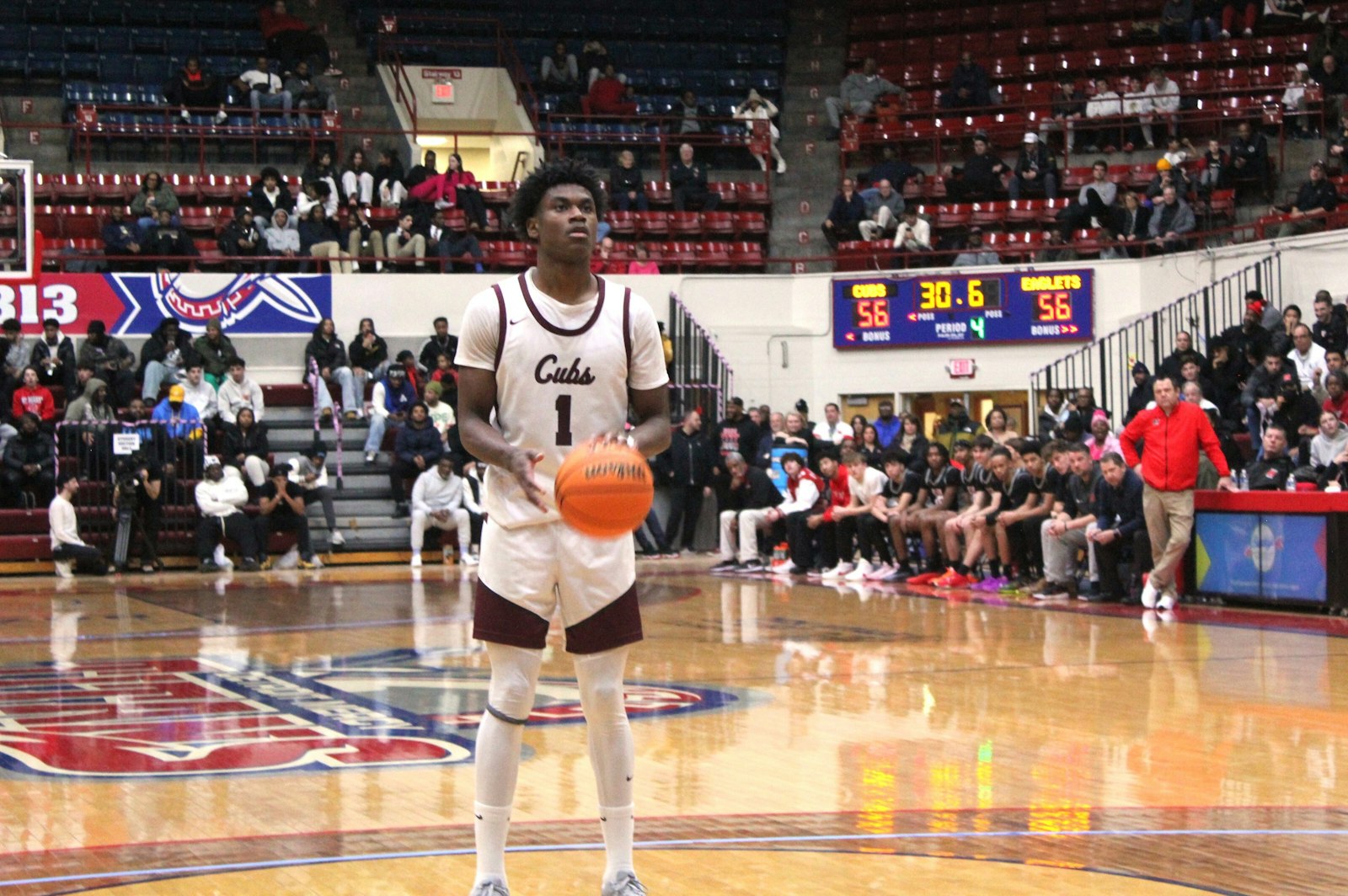 The game was tight throughout the entire second half. Here, University of Detroit Jesuit’s Xavier Johnson is about to break a tie in the final minute of the contest. He made one of two free throws to give the Cubs a short-lived lead.