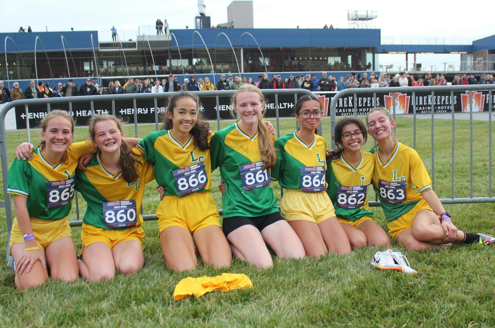 Meet the state-champion cross-country team from Jackson Lumen Christi: Samantha Schroeder, Macy Fazekas, Thia Tello, Sydney Fazekas, Mia Sanchez, Layla Lopez and Madison Osterberg. (Wright Wilson | Special to Detroit Catholic)