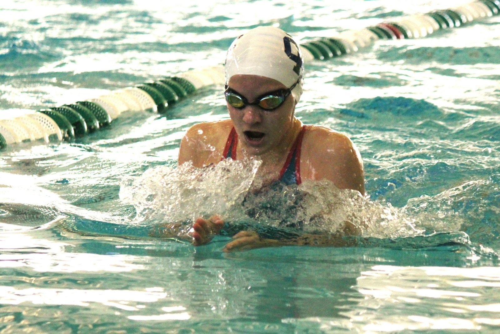 Bloomfield Hills Cranbrook freshman Elizabeth Kurz comes up for air in the final stretch of the 100 breaststroke. Kurz won the race with a time of 1:07.69, contributing to the Cranes’ second-place team finish overall.