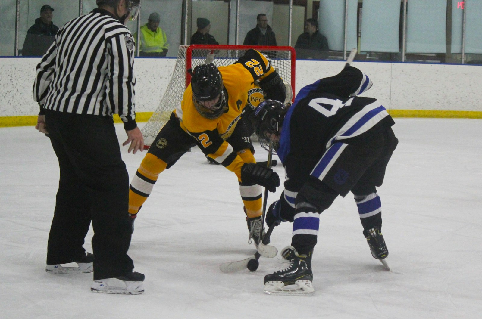Bishop Foley United’s co-operative agreement even extends to the public schools. Blake Holtkamp, a senior from Madison Heights Lamphere, goes after the puck on a faceoff.