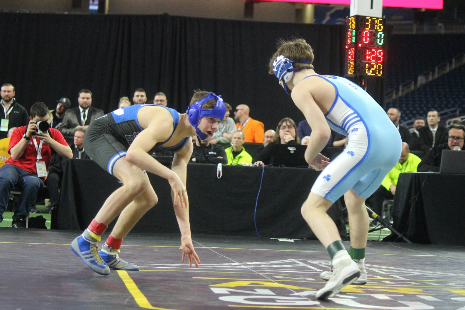 Yes, that’s a championship match pitting two Detroit Catholic Central teammates head-to-head. Wyatt Lees (left) won a state title for the third season in a row, defeating Ryan Totten, 3-0, on an early takedown.