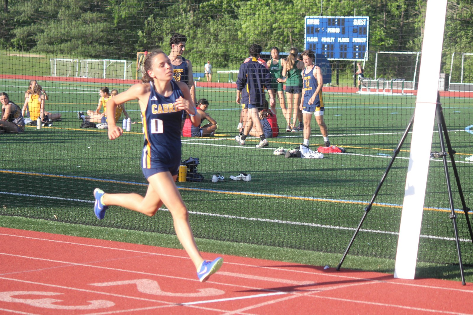 For the fourth year in a row, Allen Park Cabrini’s Ava Teed crosses the finish line first in the 3200 meter run. Teed also won the 800 and 1600, plus ran on the Monarchs’ winning 4x400 relay.