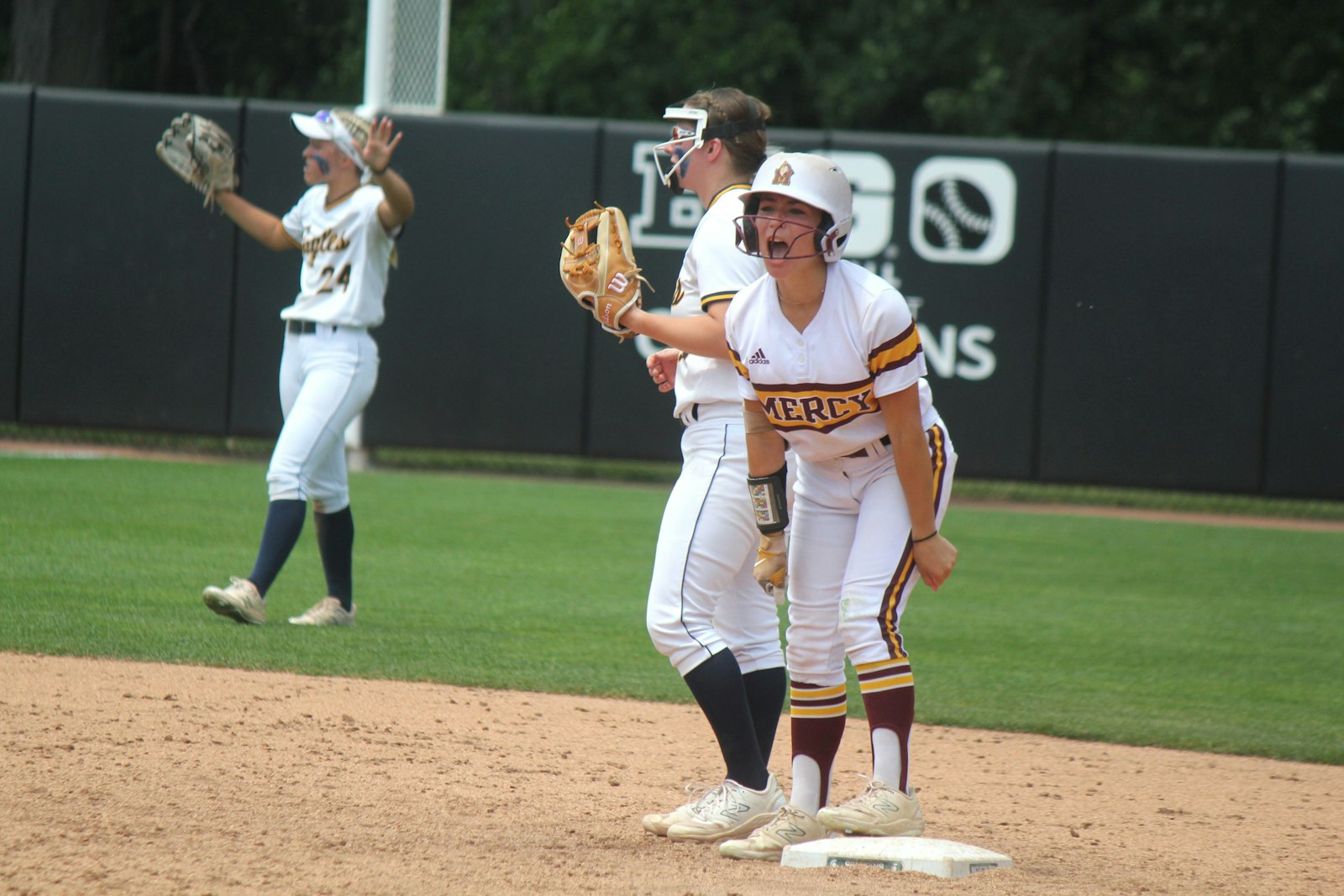 Farmington Hills Mercy centerfielder Sophia Chaput yells out to the dugout after reaching second base safely in the bottom of the seventh inning. However, that was the only hit Mercy managed against Hudsonville all afternoon.