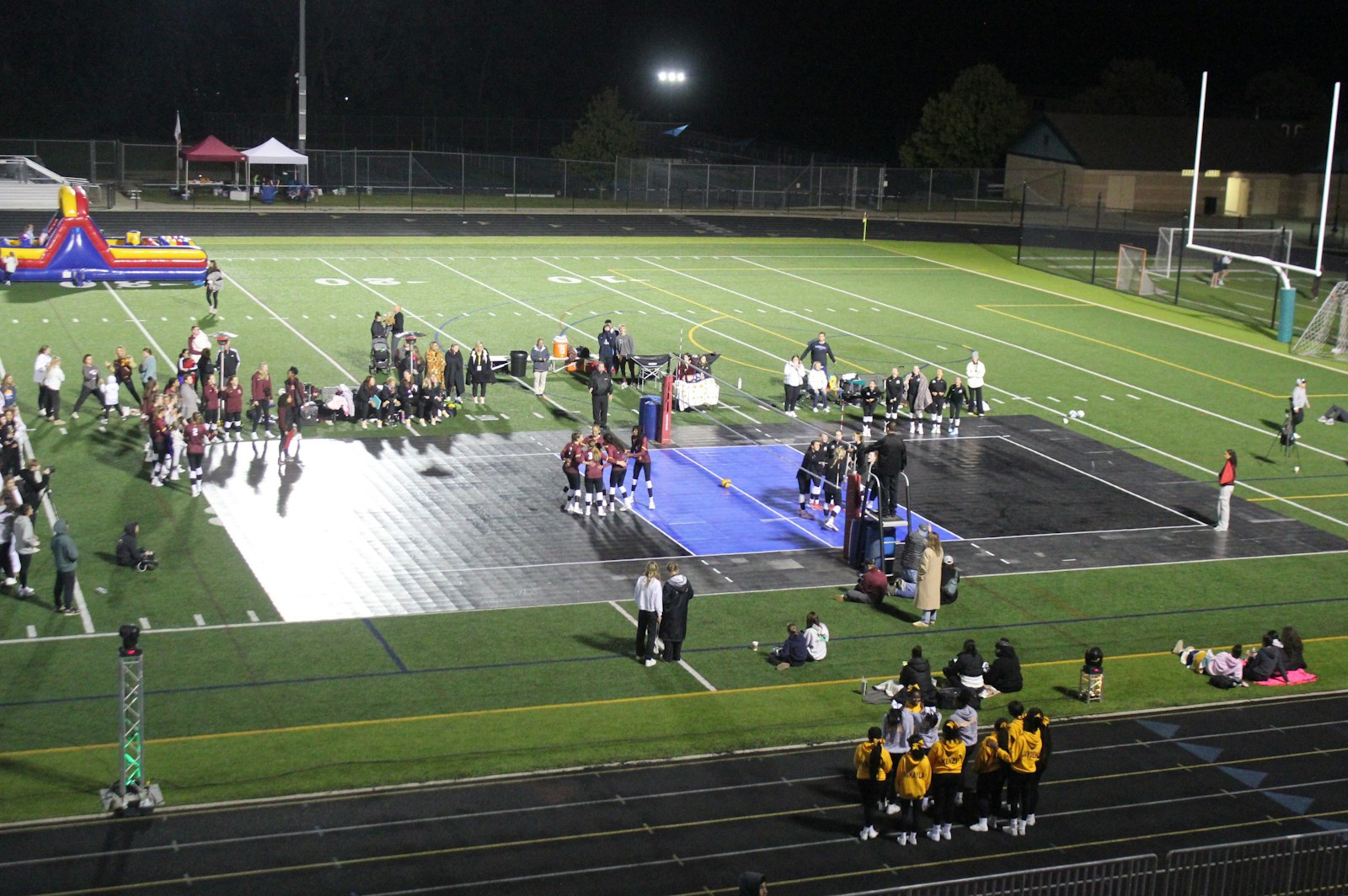 This was the view from high atop the bleachers during the inaugural Michigan Volleyball Classic, where Mercy, Forest Hills Northern, Clarkston and Mercy scrimmaged on temporary courts placed atop the artificial-turf football field.