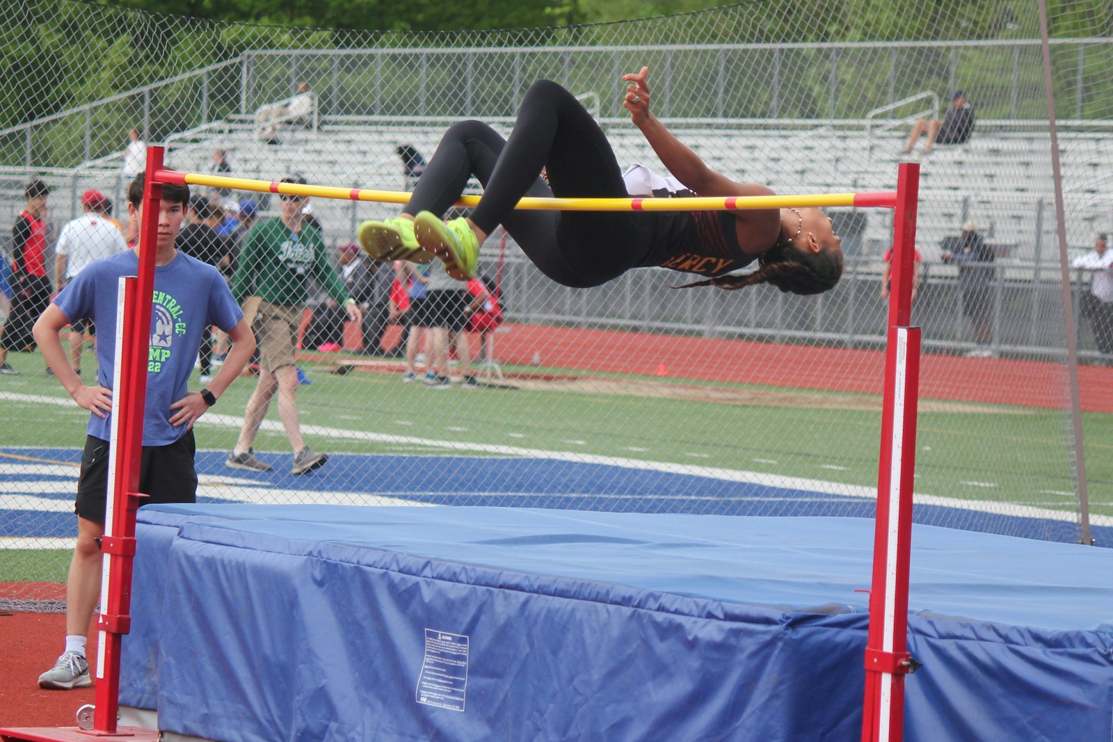 Farmington Hills Mercy’s Milena Chevallier clears the high jump bar on this attempt which tied the Catholic League’s record of 5 feet, 6.5 inches.