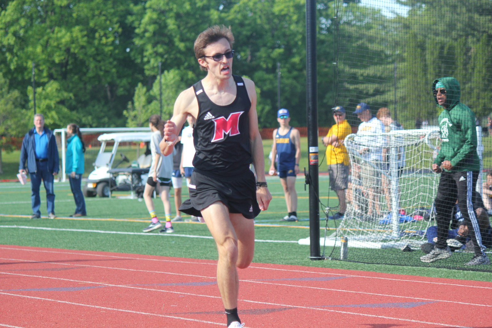 Tyler Lenn of Marine City Cardinal Mooney, who won three individual events at last month’s Catholic League track championship meet, set a state record for Division 4 runners in the 1600 meters, winning the race in 4:14.30 at Hudsonville.