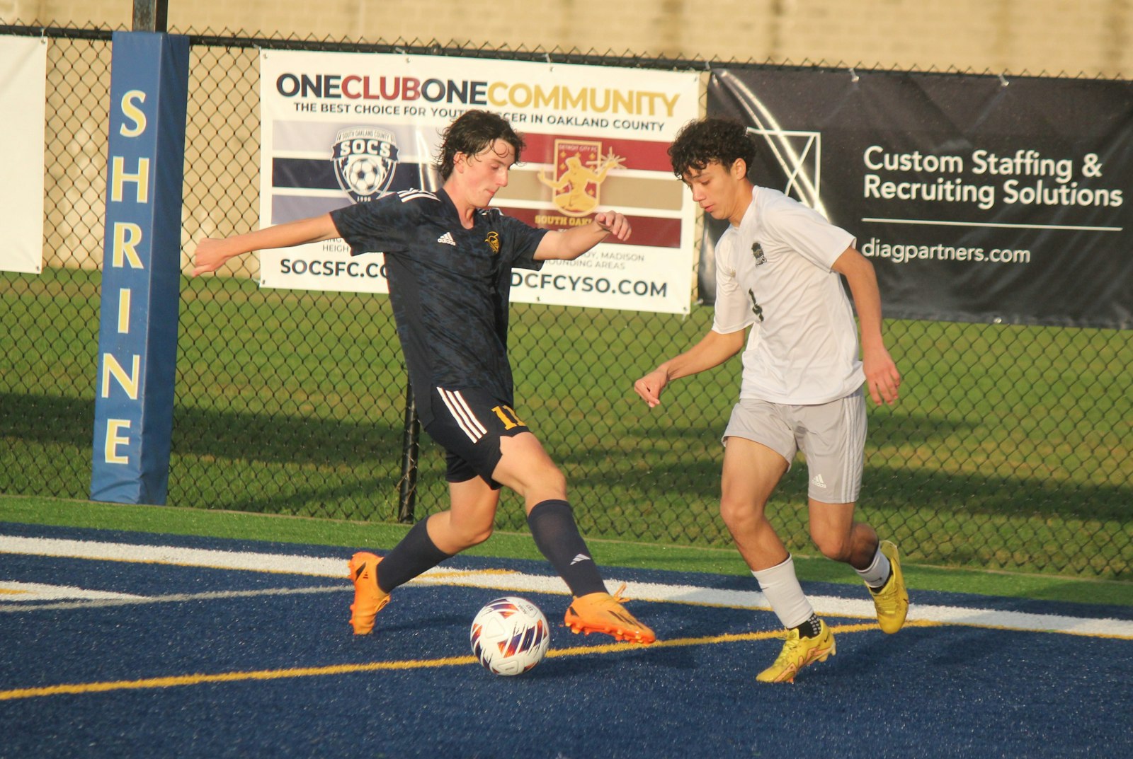 Royal Oak Shrine’s Will Bernacki fights for the ball against Detroit Cristo Rey’s Samuel Granados in second-half action from the Catholic High School League’s Cardinal Division championship game played Oct. 1 at Shrine.